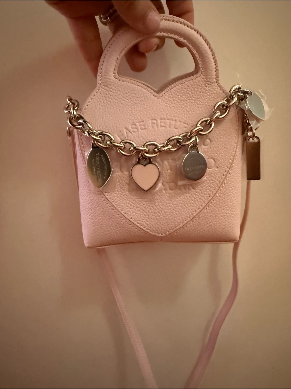Tiffany & Co. Return To Tiffany Micro Mini Charm Tote Bag in pale pink leather